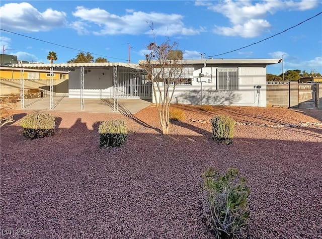 view of front of property with a patio