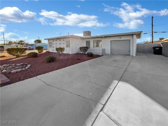 single story home with a garage