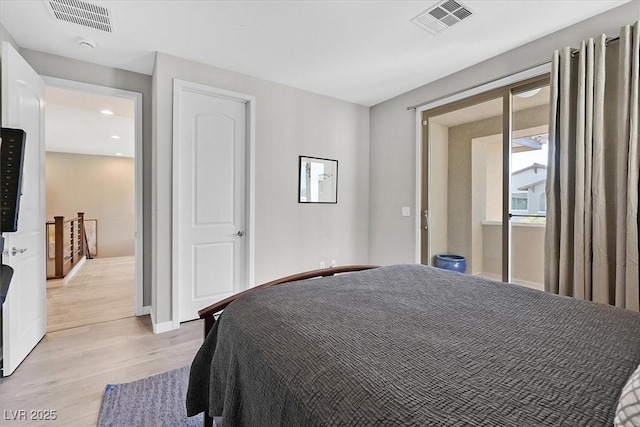 bedroom featuring light hardwood / wood-style flooring