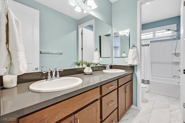 full bathroom with shower / bath combination with curtain, vanity, and toilet