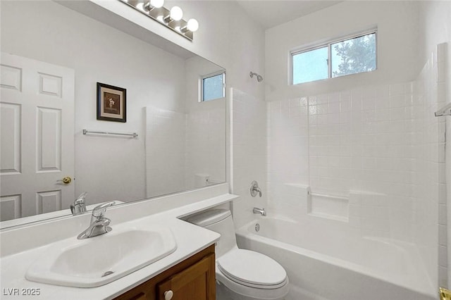 full bathroom featuring toilet, vanity, and  shower combination