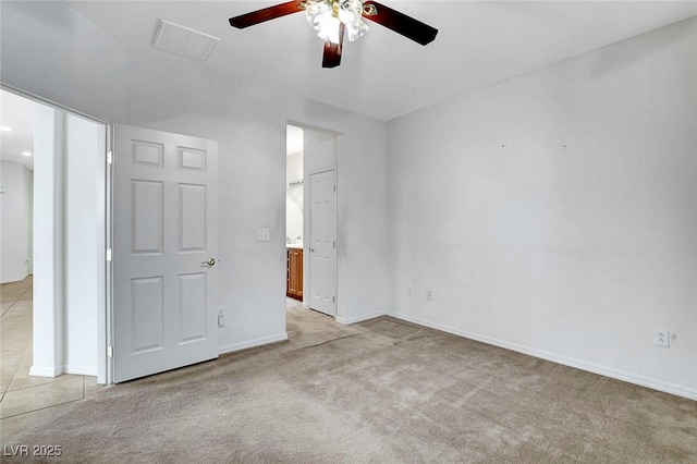 unfurnished bedroom with light colored carpet and ceiling fan