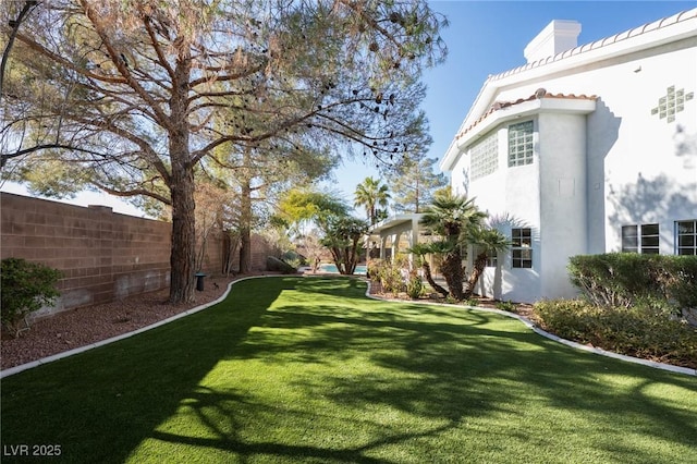 view of yard featuring fence