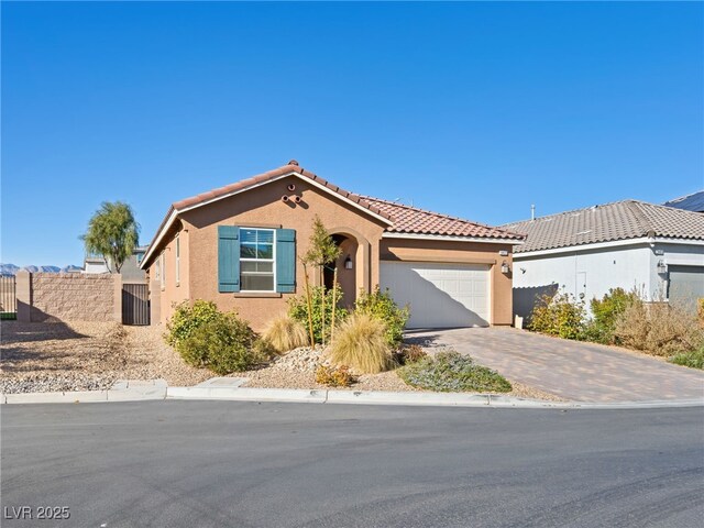 view of front of property with a garage