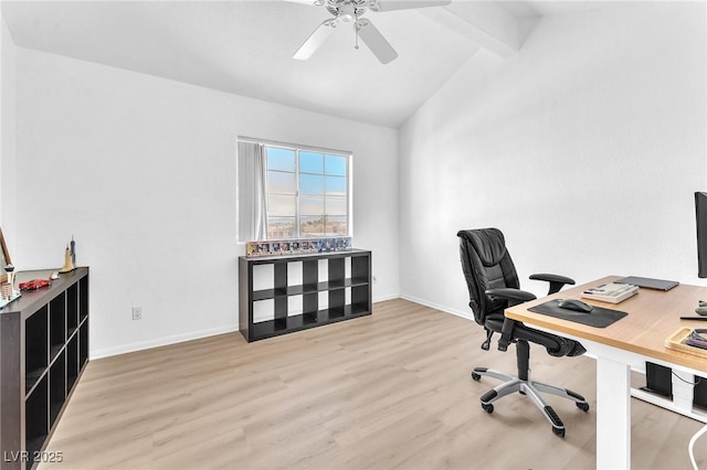 home office with light wood-type flooring, lofted ceiling with beams, and ceiling fan