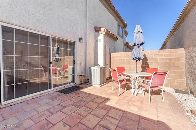 view of patio with central AC unit