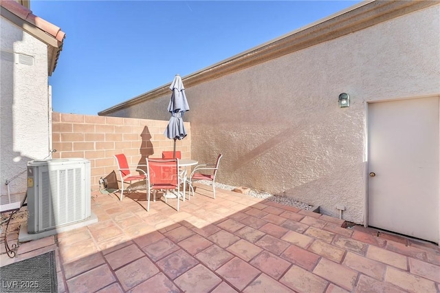 view of patio featuring central AC