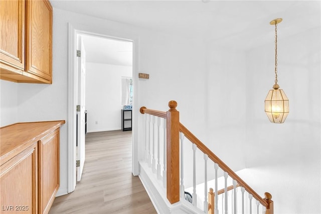 hallway featuring light wood-type flooring