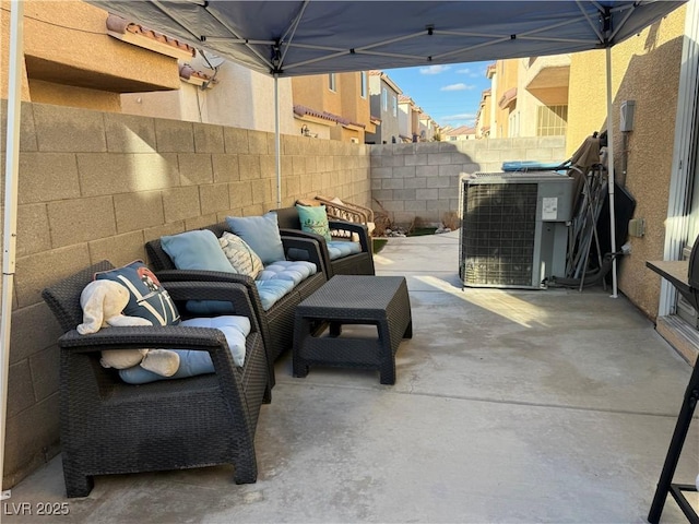 view of patio / terrace featuring cooling unit and outdoor lounge area