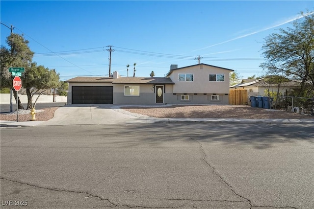 split level home with a garage