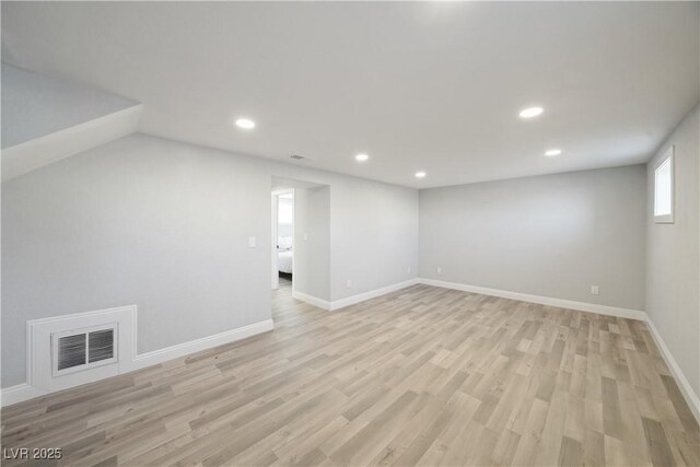 unfurnished room featuring light hardwood / wood-style flooring