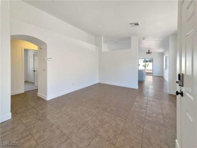 spare room with light tile patterned floors