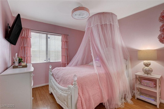 bedroom featuring hardwood / wood-style floors