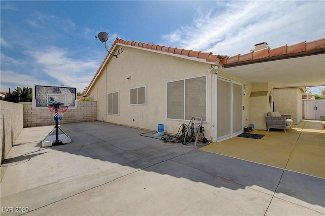 rear view of house with a patio area