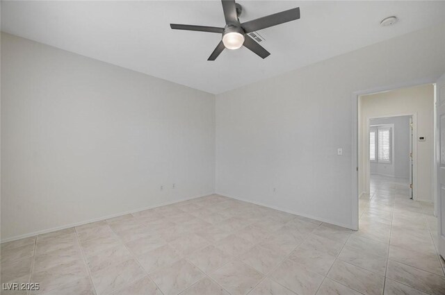 empty room with ceiling fan