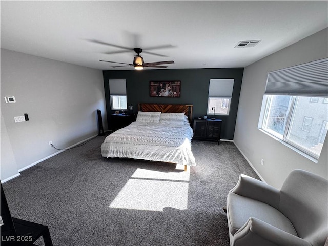 carpeted bedroom featuring ceiling fan