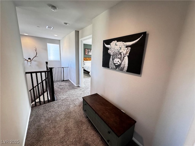 hallway with carpet