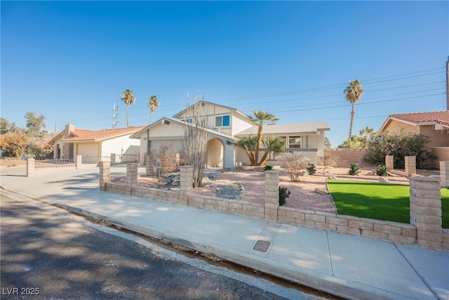 view of front of property featuring a garage