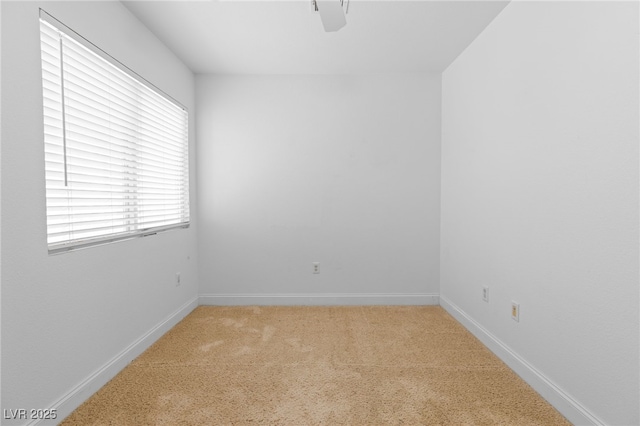 empty room with carpet flooring