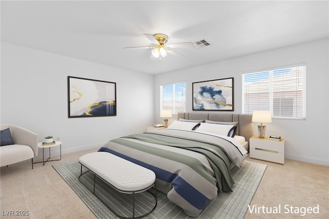 bedroom featuring ceiling fan and light colored carpet