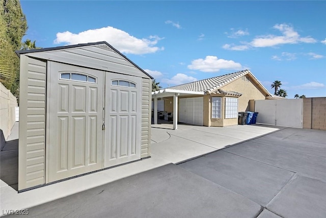 view of outbuilding with a garage