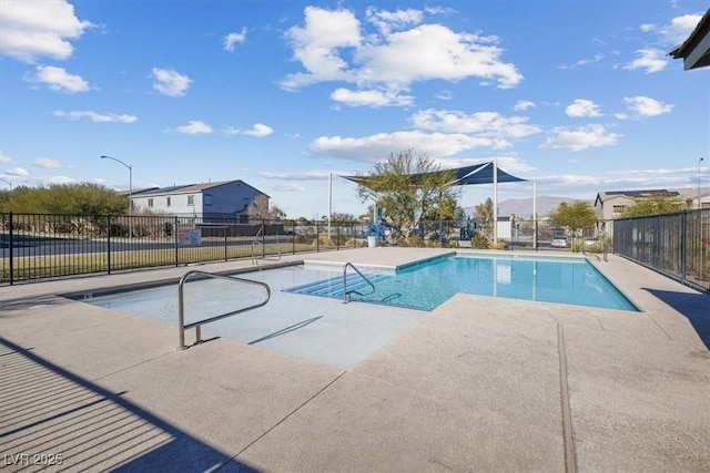 view of swimming pool featuring a patio