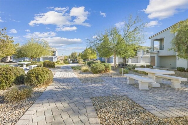 view of community with a patio area