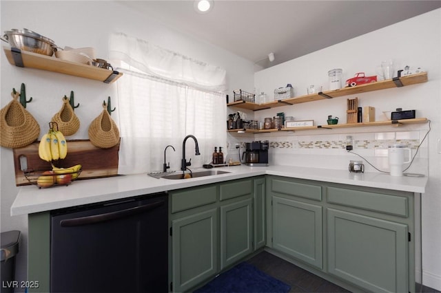 kitchen with sink, dishwasher, and green cabinets