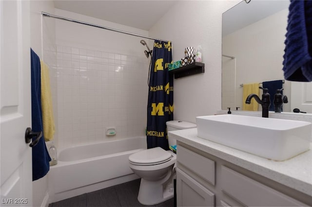 full bathroom with shower / bath combination with curtain, vanity, and toilet