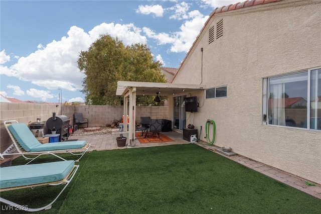 view of yard with a patio area