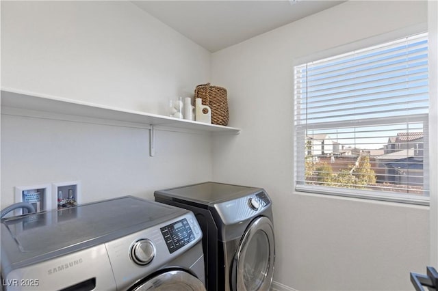 laundry room with washer and clothes dryer