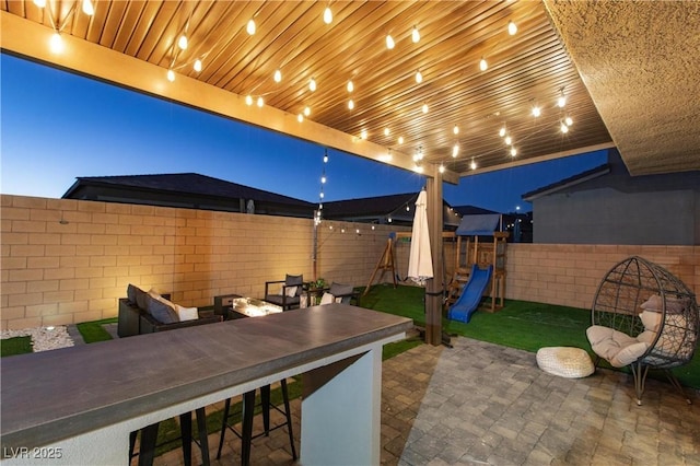 view of patio featuring a playground