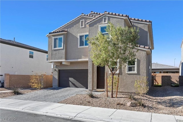 view of front of property featuring a garage