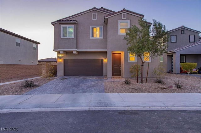 view of front of property featuring a garage