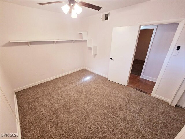 empty room featuring ceiling fan