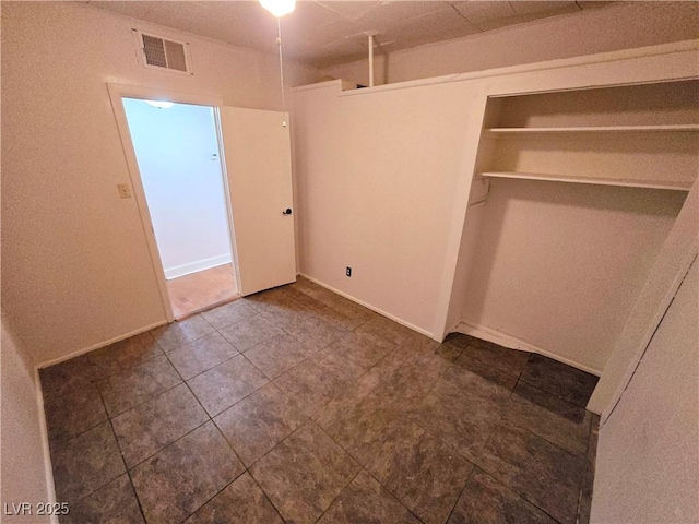 unfurnished bedroom featuring a closet