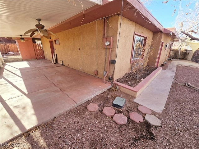 view of patio with ceiling fan