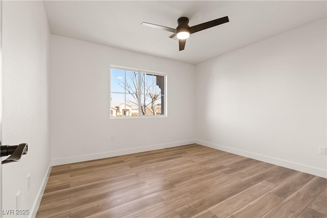 unfurnished room with ceiling fan and light hardwood / wood-style flooring