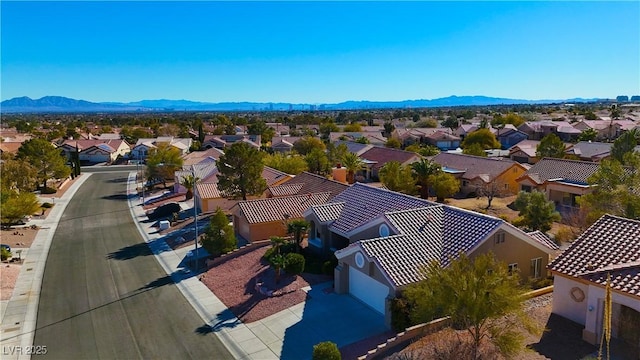 drone / aerial view featuring a mountain view