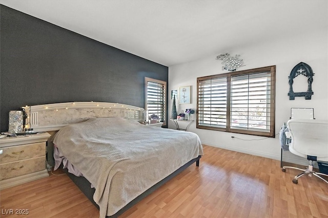 bedroom featuring light wood-type flooring