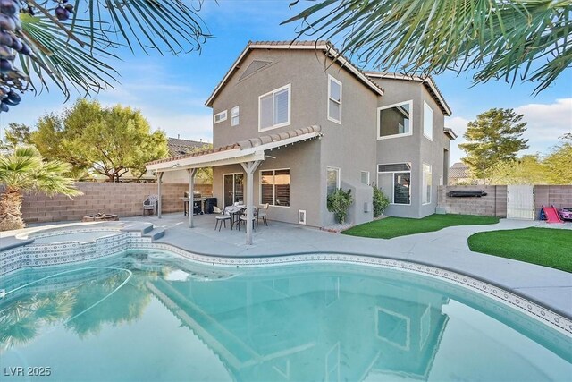 rear view of house featuring a patio, a fenced in pool, and a pergola