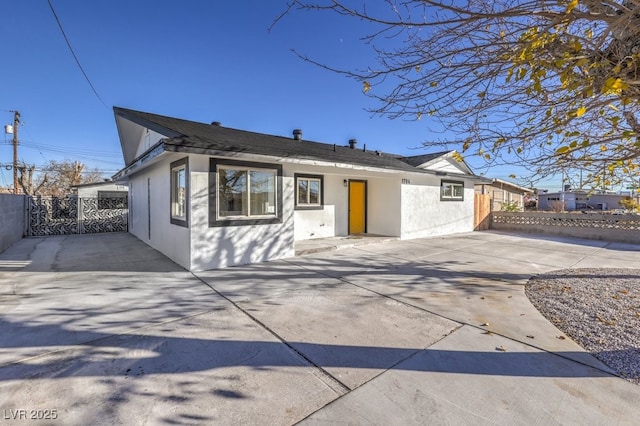 back of property featuring a patio