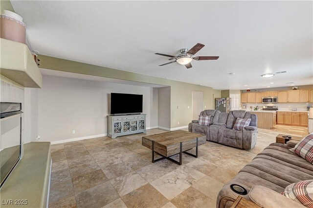 living room featuring ceiling fan