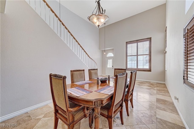 dining area featuring a chandelier