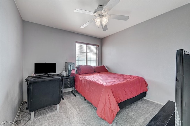 bedroom featuring ceiling fan and carpet floors