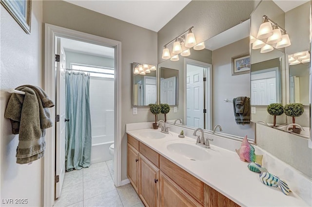 full bathroom featuring tile patterned flooring, toilet, vanity, and shower / bath combo