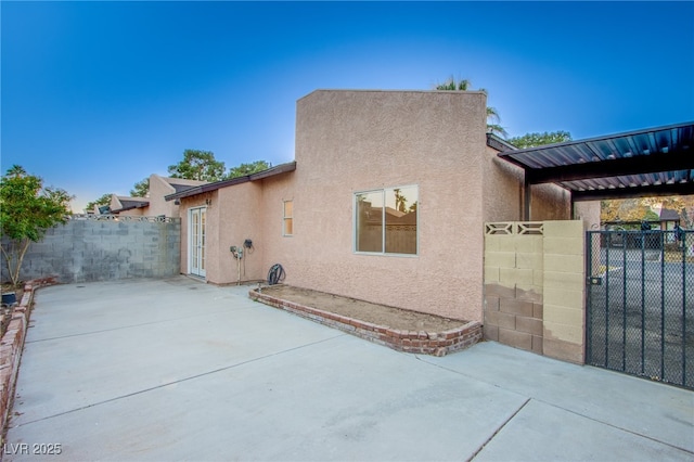 rear view of house with a patio