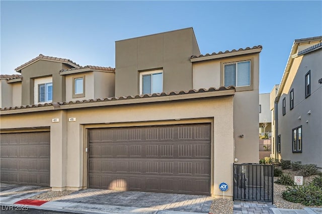 view of front of property with a garage