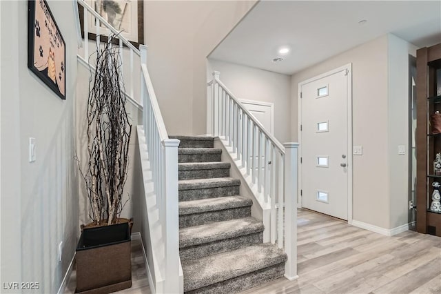 foyer entrance featuring light wood-type flooring