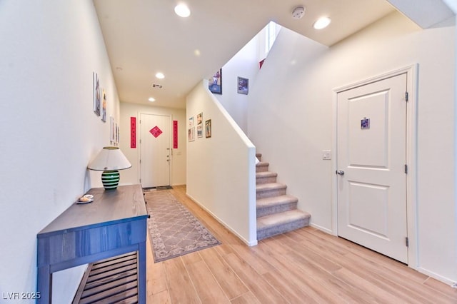 foyer with hardwood / wood-style flooring